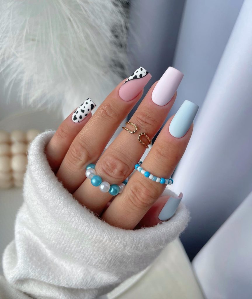 Blue, Pink, and White Pastel with Black Cow Print Nails