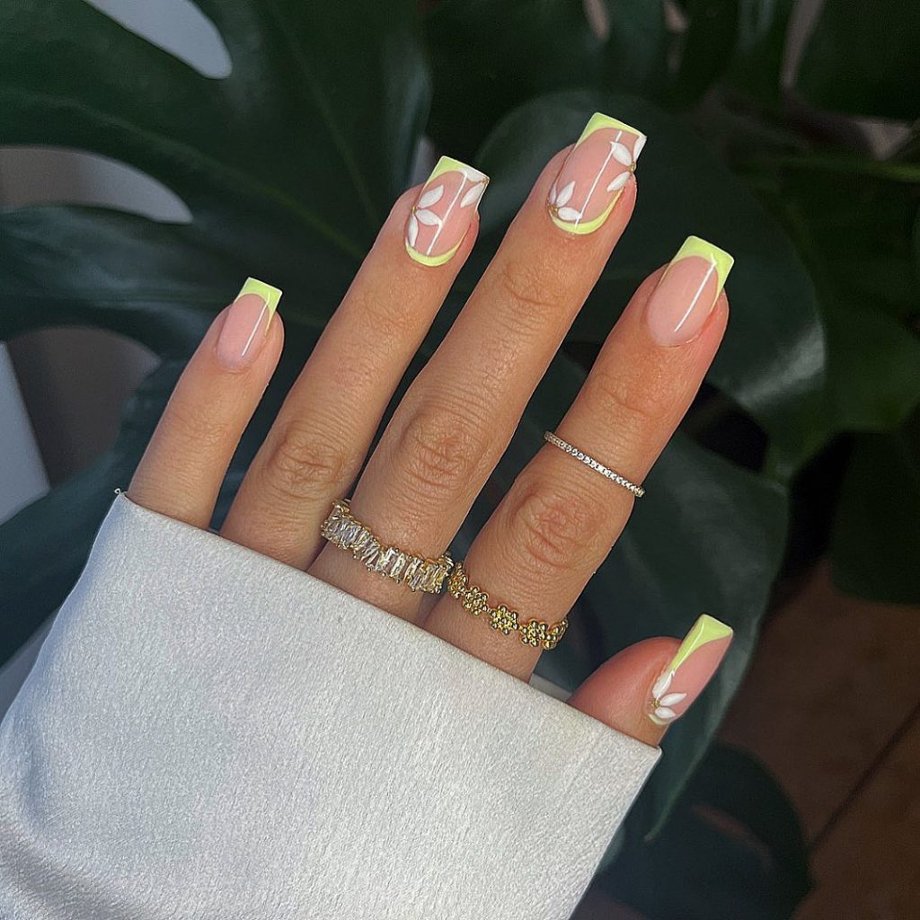 Yellow Tips with White Flowers Nail Art
