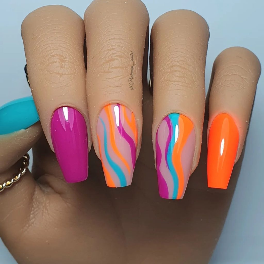 orange and purple swirl nails