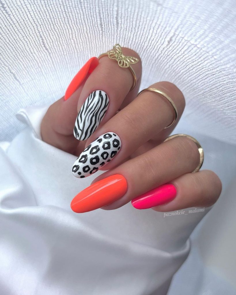 pink and orange animal print nails