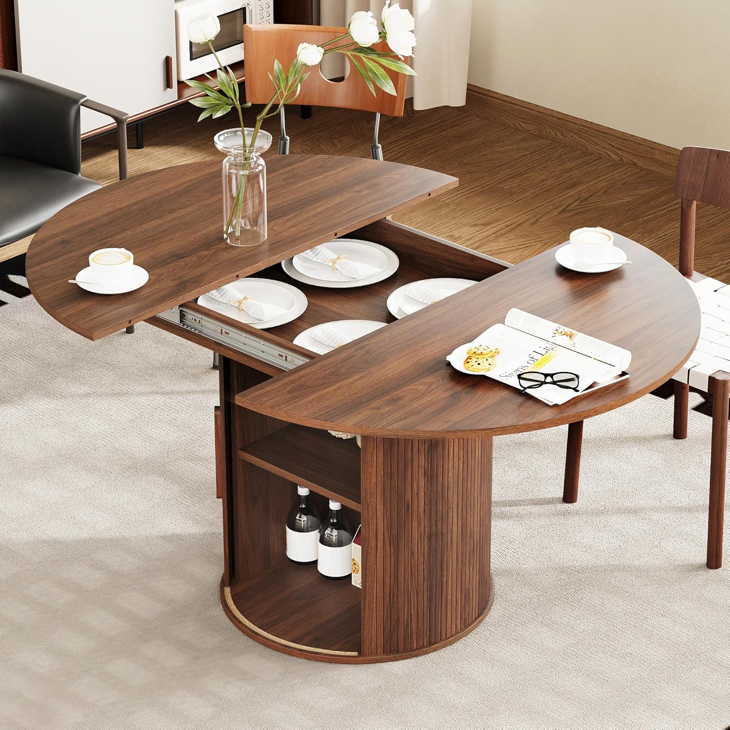 Wooden round-to-oval dining table with fluted sliding door cabinet and hidden storage