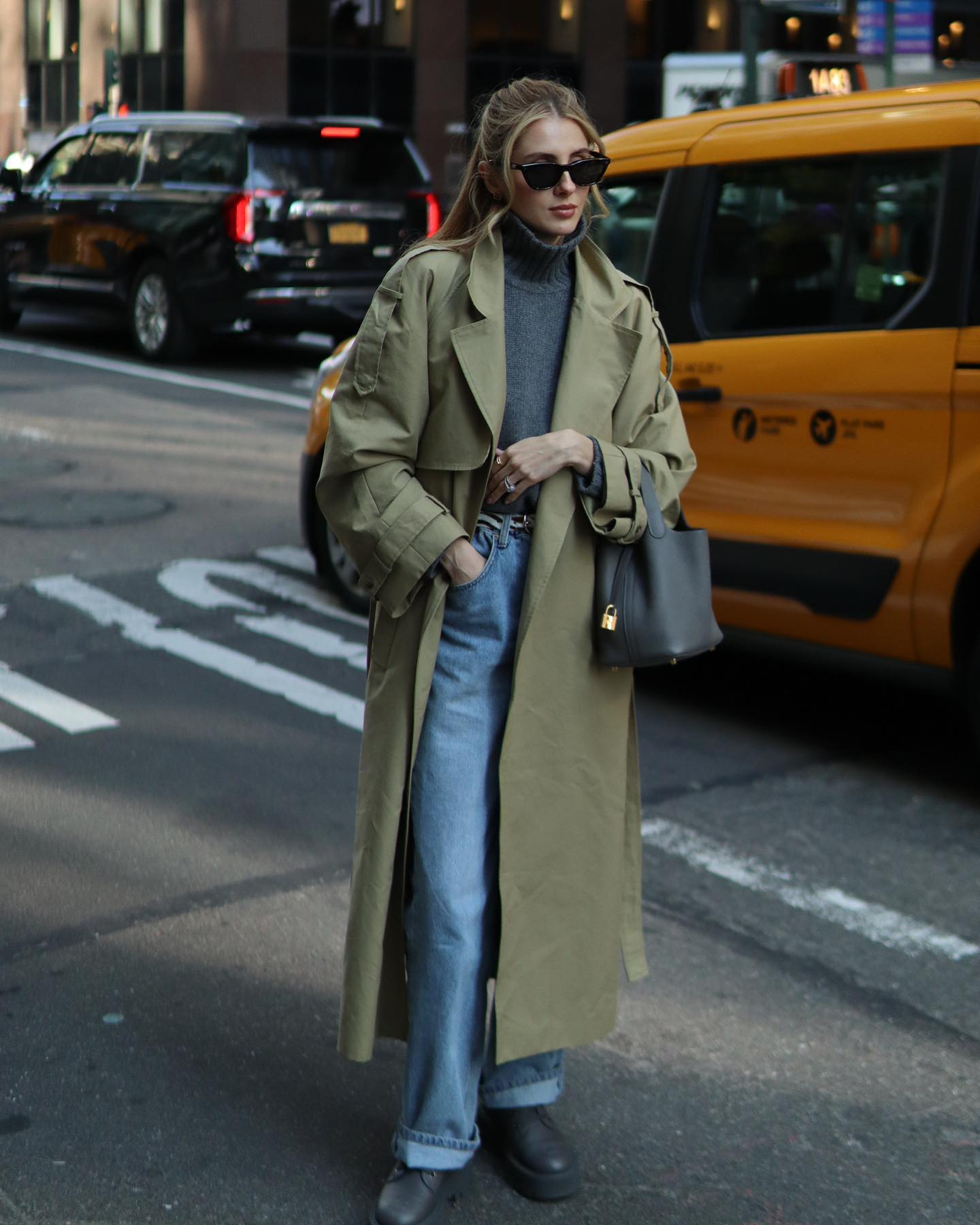 Olive Trench Coat + Grey Turtleneck + Blue Jeans + Boots